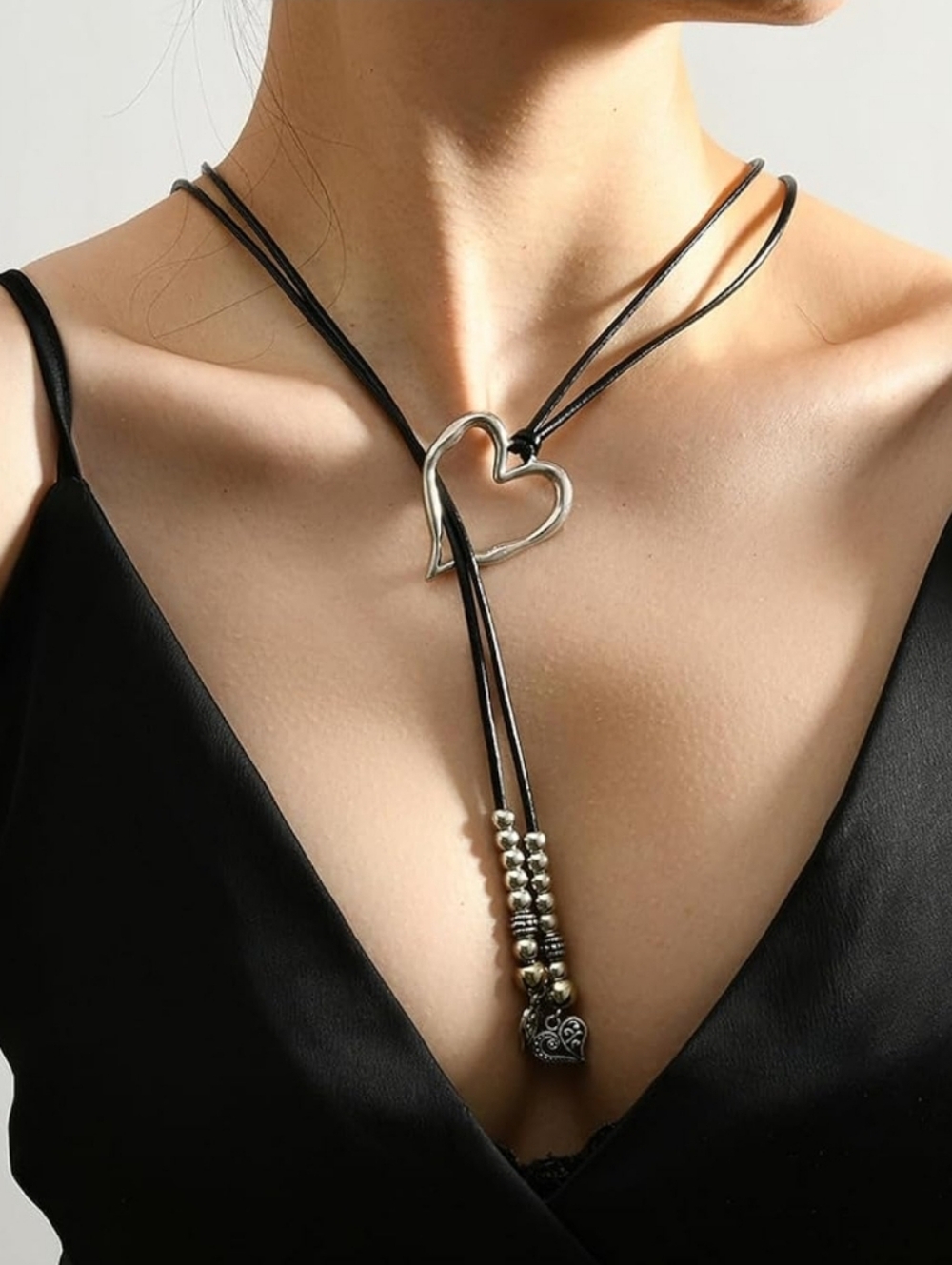 Black Leather Heart Lariat Necklace with Silver Accents. NWT in Package